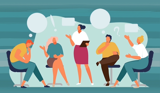 facilitator and group of white people in animated discussion